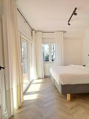Cama o camas de una habitación en Apartamentos BEJAR - DUCAL