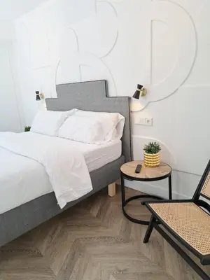 Cama o camas de una habitación en Apartamentos BEJAR - DUCAL