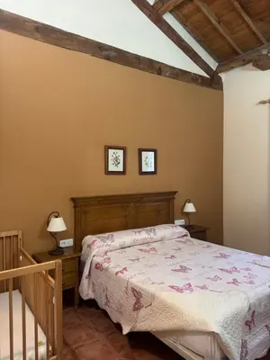 Cama o camas de una habitación en Casa Rural Concejo 1