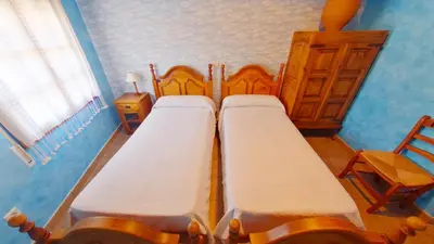Cama o camas de una habitación en GREDOS RURALRUT en El Tiemblo, cerca del famoso CASTAÑAR, la Reserva Natural VALLE DE IRUELAS y zonas de baño naturales a pocos metros