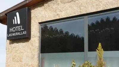 Certificado, premio, señal o documento que está expuesto en Hotel Las Murallas