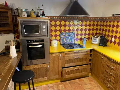 Una cocina o zona de cocina en Casa Rural Los Robles de Acebo II