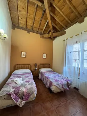 Cama o camas de una habitación en Casa Rural Concejo 2