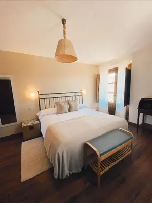 Cama o camas de una habitación en Hotel Rural Candela y Plata