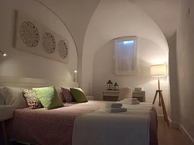 Cama o camas de una habitación en Apartamento Turístico Marem Cáceres