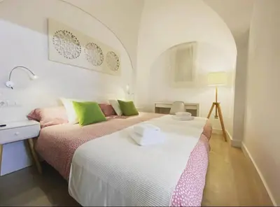 Cama o camas de una habitación en Apartamento Turístico Marem Cáceres