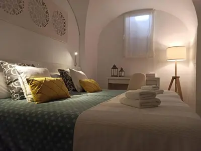 Cama o camas de una habitación en Apartamento Turístico Marem Cáceres