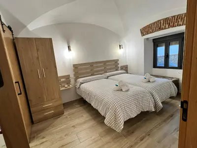 Cama o camas de una habitación en Casa rural Maila