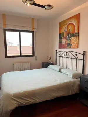Cama o camas de una habitación en MYM Vivienda Ávila, buena situación. VUT-AV-00805