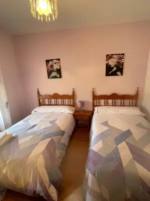 Cama o camas de una habitación en CASA BRIGIDA