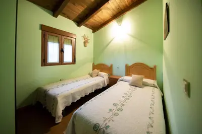 Cama o camas de una habitación en La Charca de la Dehesa