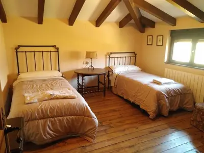 Cama o camas de una habitación en La Cirujana de Gredos