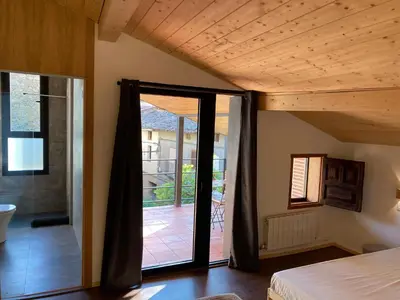 Cama o camas de una habitación en El jazmín de la Fuente casa rural