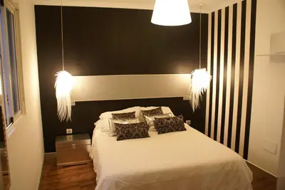 Cama o camas de una habitación en Precioso Apartamento - Casco Antiguo de Talavera