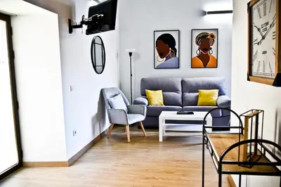 Zona de estar de Apartamentos Turaca
