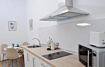 Una cocina o zona de cocina en Apartamentos Turaca