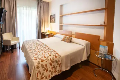 Cama o camas de una habitación en Hotel Parque de Monfragüe