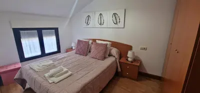 Cama o camas de una habitación en Vivienda Turistica IBAMA1