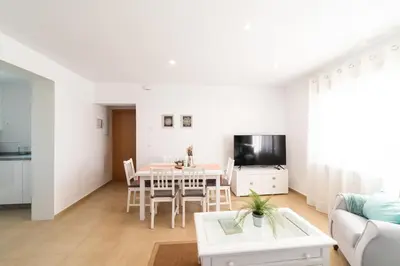 Una televisión o centro de entretenimiento en Apartamentos Turísticos Casa Morocho