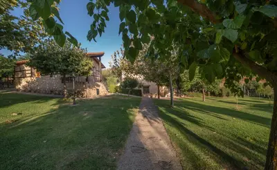 Jardín al aire libre en Las Cabañas de La Vera