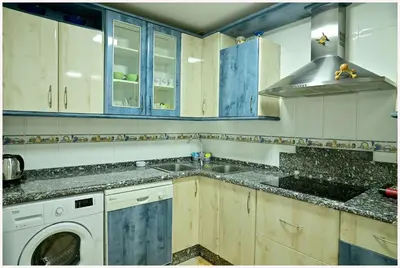 Una cocina o zona de cocina en apartamentos MERIDA LÚDICA parking gratis
