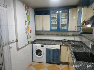 Una cocina o zona de cocina en apartamentos MERIDA LÚDICA parking gratis
