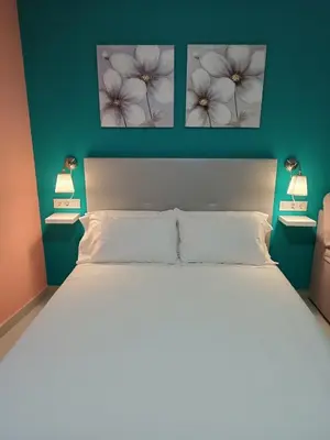 Cama o camas de una habitación en Estudios La Casina