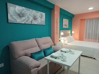 Cama o camas de una habitación en Estudios La Casina