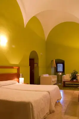 Cama o camas de una habitación en Hotel Conventual de Alcántara