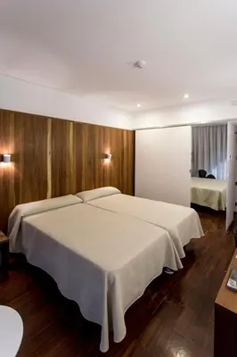 Cama o camas de una habitación en Hotel Conventual de Alcántara