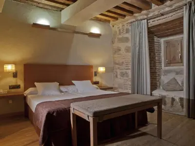 Cama o camas de una habitación en Hotel Las Leyendas