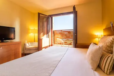 Cama o camas de una habitación en Izan Puerta de Gredos