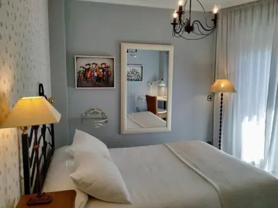 Cama o camas de una habitación en Hostal Rural Luna y Hostal Rural Lunaposada