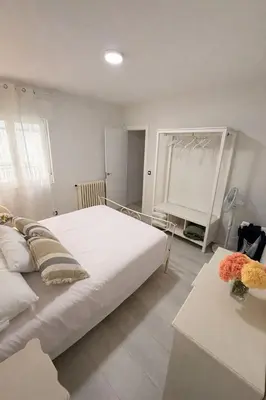 Cama o camas de una habitación en Muralla Home
