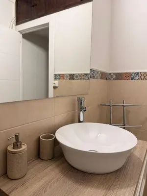 Un baño de Muralla Home
