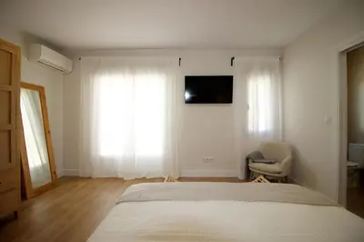 Una televisión o centro de entretenimiento en Casa Verata