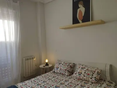 Cama o camas de una habitación en Piso.2hab+2baños+garaje+Asc+A C.