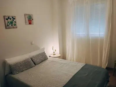 Cama o camas de una habitación en Piso.2hab+2baños+garaje+Asc+A C.