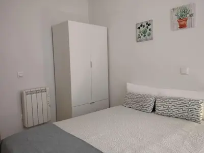 Cama o camas de una habitación en Piso.2hab+2baños+garaje+Asc+A C.