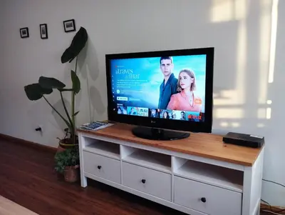 Una televisión o centro de entretenimiento en Piso.2hab+2baños+garaje+Asc+A C.
