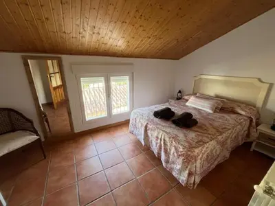 Cama o camas de una habitación en Casa rural collao de lobo