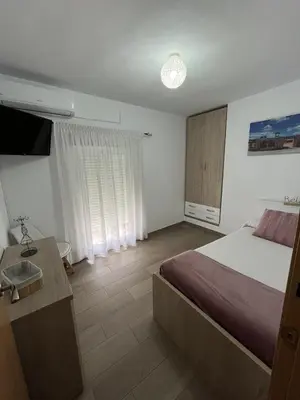 Cama o camas de una habitación en CASA GODOY