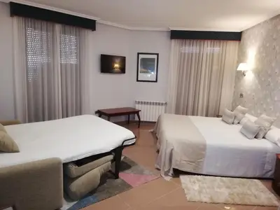 Cama o camas de una habitación en Hotel Las Moradas