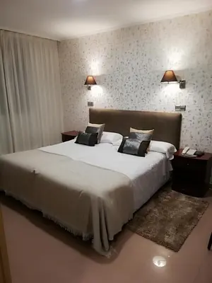 Cama o camas de una habitación en Hotel Las Moradas