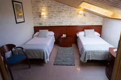 Cama o camas de una habitación en Hotel Las Moradas