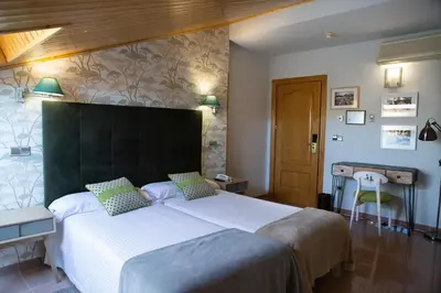 Cama o camas de una habitación en Hotel Las Moradas
