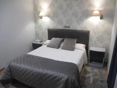 Cama o camas de una habitación en Hotel Las Moradas