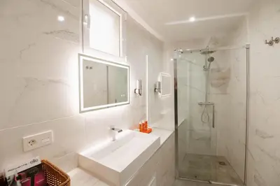 Un baño de Apartamentos Turísticos A Tu Verita