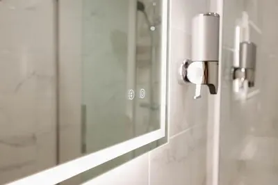 Un baño de Apartamentos Turísticos A Tu Verita