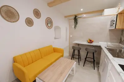 Una cocina o zona de cocina en Apartamentos Turísticos A Tu Verita